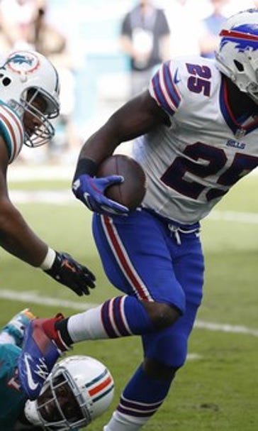 The Latest: Chargers DT Reid carted off with knee injury